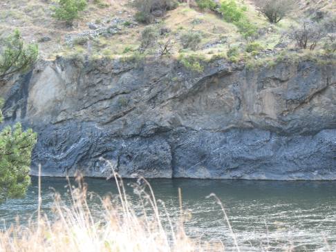 Extremely hard basalt cut clean by the swift flowing Salmon River near Riggins