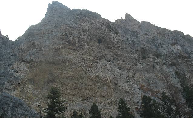 Cavities and caves visible in limestone cliffs