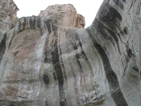 Sandstone cliff above pool at El Morrow National Monument
