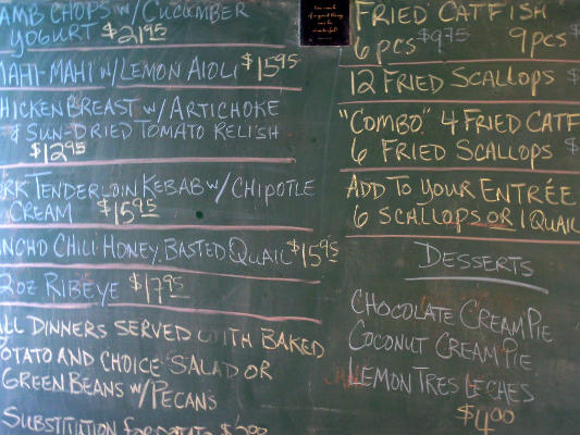 Menu board at Mac & Ernies Roadside Eatery in Tarpley, Texas