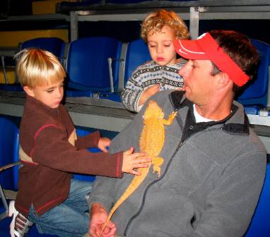 Jeff Hendrix with Stephen & Bennett Hendrix & bearded lizard Gulf World 