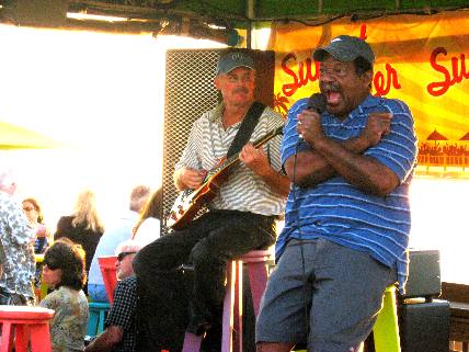 This entertainer at Sunset Pier was so antimated with his love songs