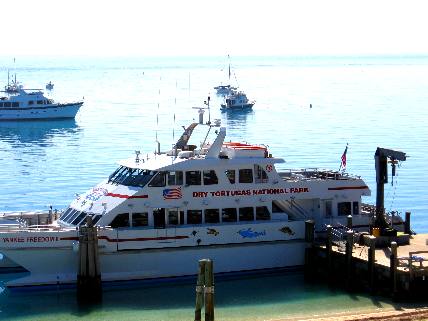 The Yankee Freedom II Dry Tortugas National Park Ferry with two private boats in background