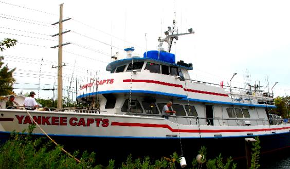 Yankee Capts party fishing boat at dock on Stock Island