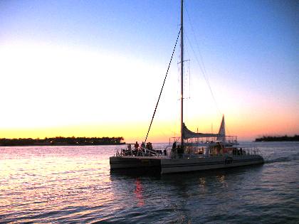 Fury Sunset Sail boat with Sunset Key and Christmas Tree Island in background