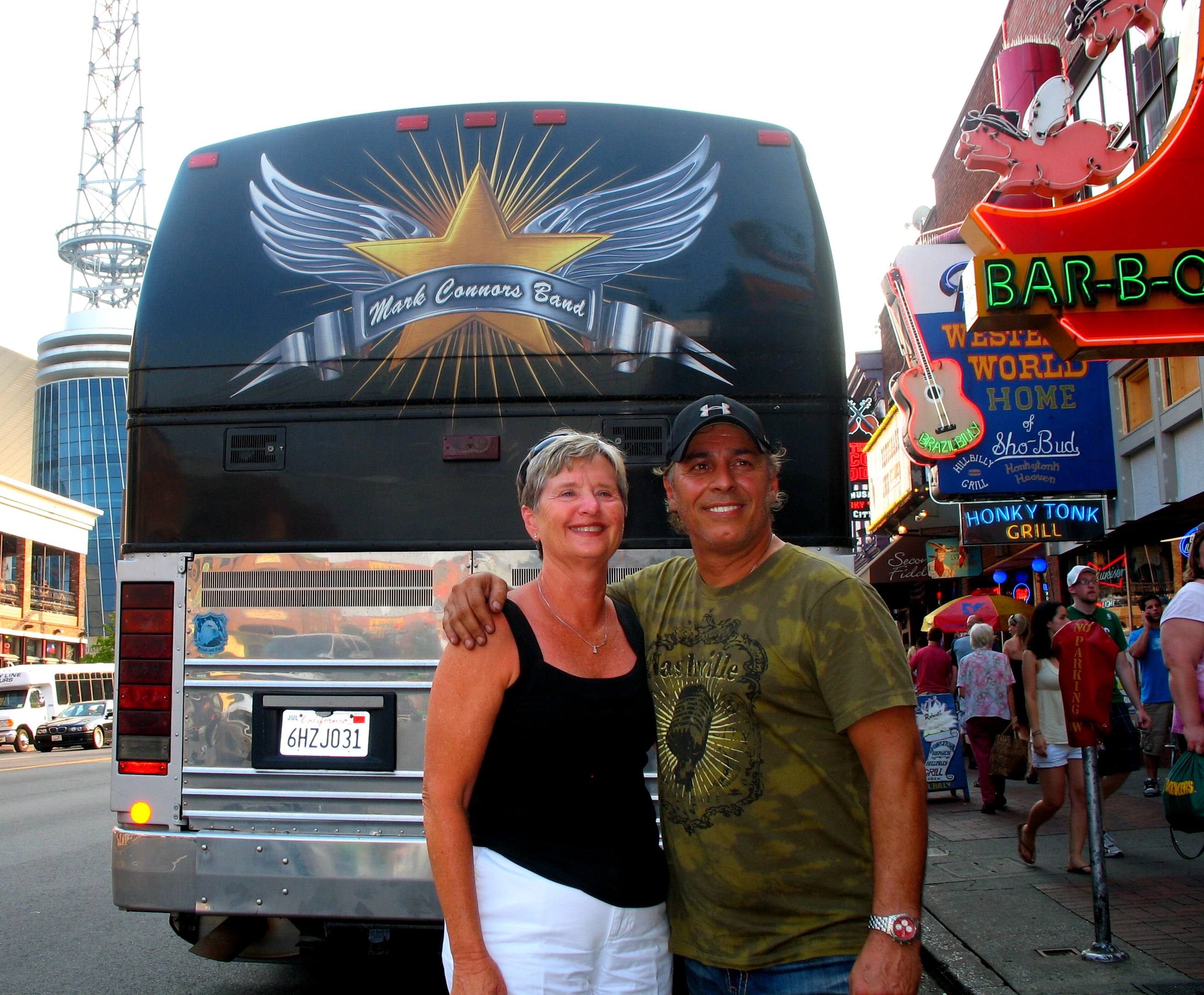 Mark Conners Bus parked in Front of The Stage On Broadway