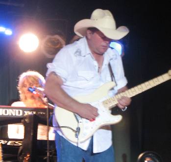 Neal McCoy's lead guitar player and keyboard player performing at Outlaw Saloon