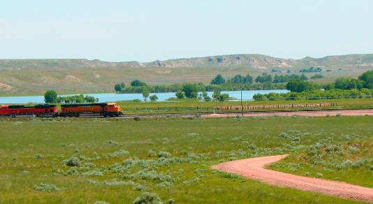 Coal train and Glendo Reservoir as seen from I-25