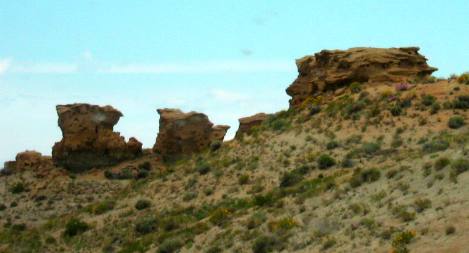 Eroded caprock reduced to hoodoos east of Shoshoni on US-20