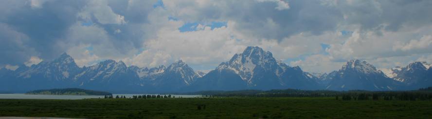 The Teton Range stretched out behind Jackson Lake and Willow Flats in Grand Teton National Park