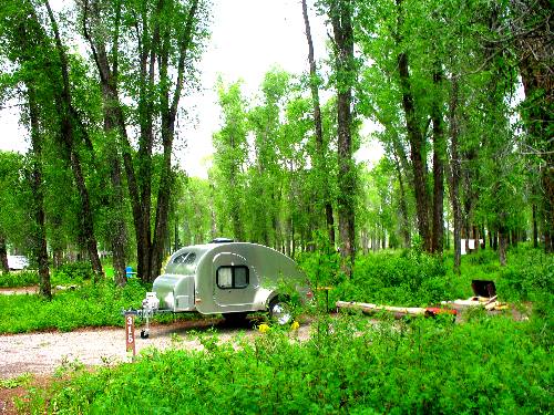 Small tear drop camper on one of the sites in Gros Ventre Campground