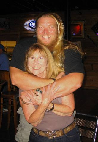 Chuck aka "Big Daddy" Meier showing Joyce what it is like to be grabbed by a BEAR
