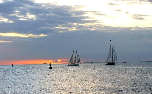 Sailing schooners Adirondack III and America 2 sailing off Key West during one of their sunset cruises in February 2012