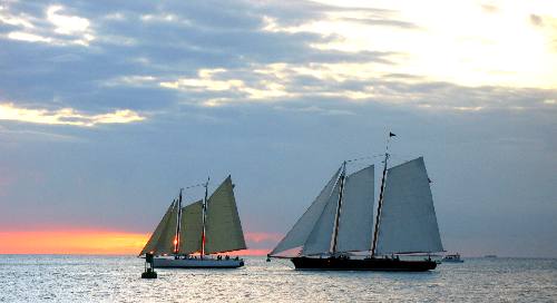 Sailing schooners Adirondack III and America 2 sailing off Key West during one of their sunset cruises in February 2012