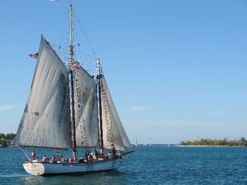 Schooner Appledore sailing by Sunset Pier with Christmas Tree Island in the background