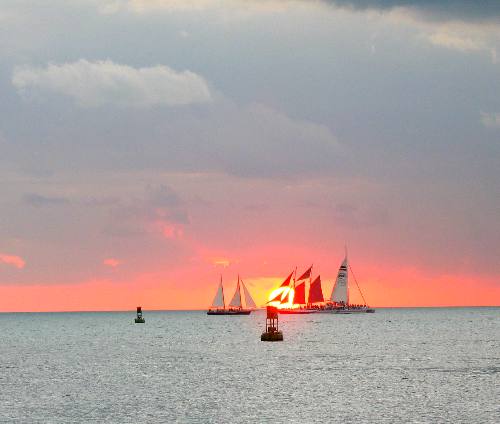 Sunset through the red sails of the Jolly II Rover one evening in February of 2012