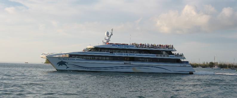 The Key West Express passing Sunset Pier on their return trip to Ft Myers