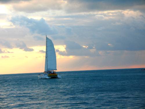 One of the Sebago fleet sailing into the sunset off Key West