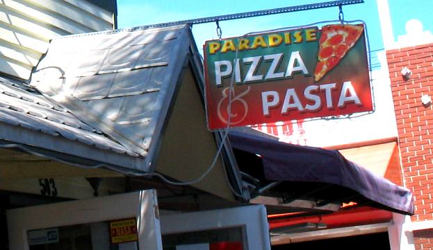 Paradise Pizza sign above the entrance door