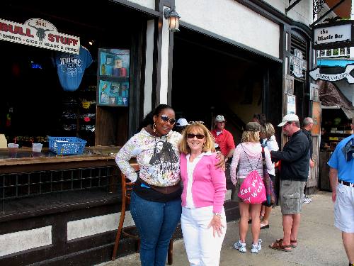 Joyce and Jasmine posing in front of the Bull & Whistle Bar on Duval Street