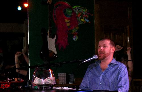 James Taylor on one of the dueling pianos at Pete's Piano Bar in Key West, Florida