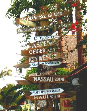 Distance marker sign outside the world famous Hogfish Grill on Stock Island
