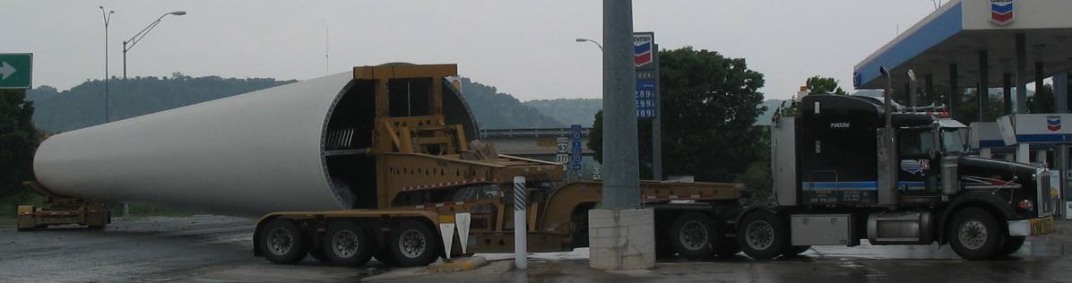 Pivoting ability of tow vehicle as driver negotiates getting into truck stop in Junction, Texas