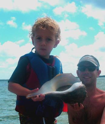 Bennett Hendrix & Jeff Hendrix with live lightning whelk