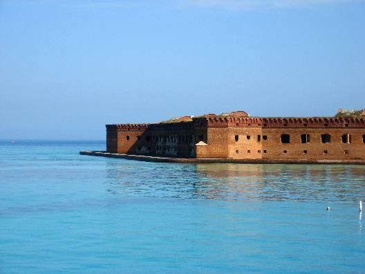 Fort Jefferson was built to protect one of the most strategic deepwater anchorages in North America. By fortifying this spacious harbor, the United States maintained an important advance post for ships patrolling the Gulf of Mexico and the Straits of Florida. Nestled within the islands and shoals that make up the Dry Tortugas, the harbor offered ships the chance to re supply, refit, or seek refuge from storms. The location of the Tortugas along one the worlds busiest shipping lanes was its greatest military asset. Though passing ships could easily avoid the largest of Fort Jeffersons guns, they could not avoid the warships that used its harbor.