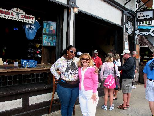 Joyce and Jasmine posing in front of the Bull & Whistle Bar on Duval Street
